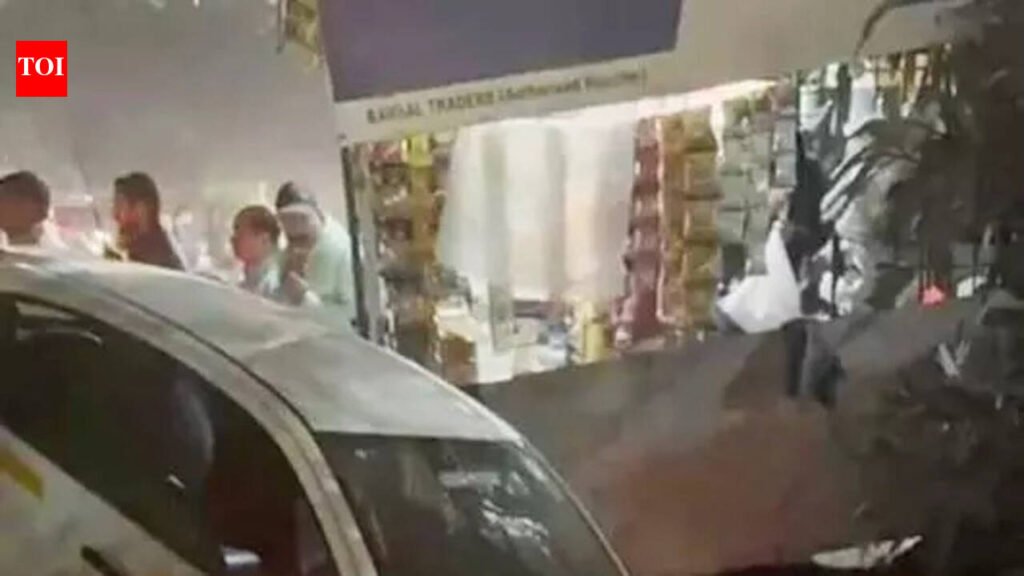 Owner steps away for shopping, parked car rolls into open drain in Noida | Noida News