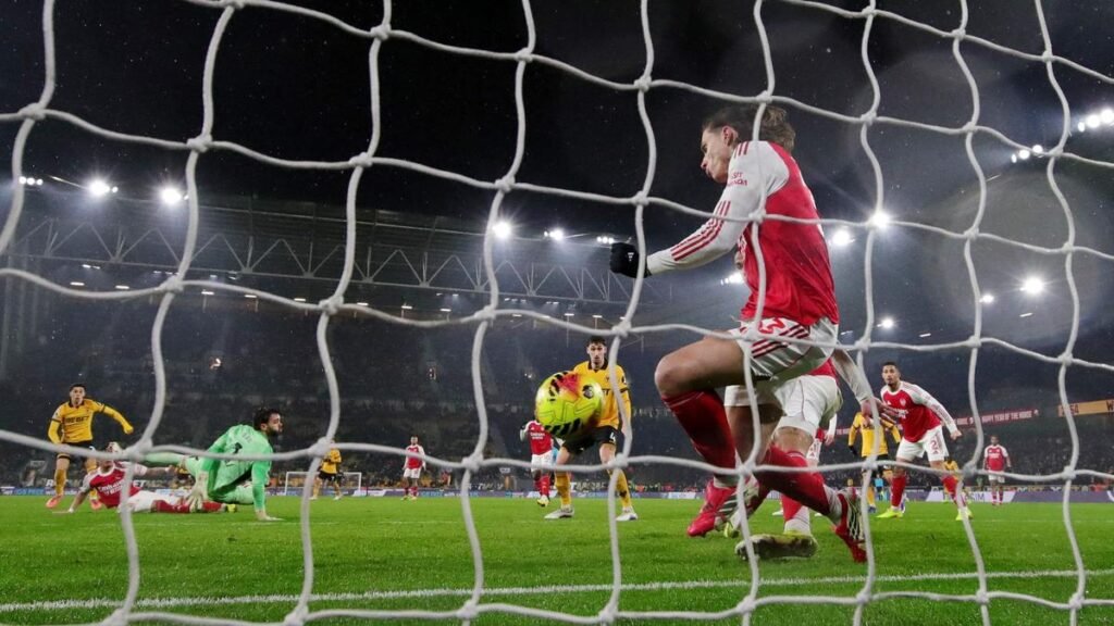 Arsenal blow two-goal lead in damaging Wolves draw