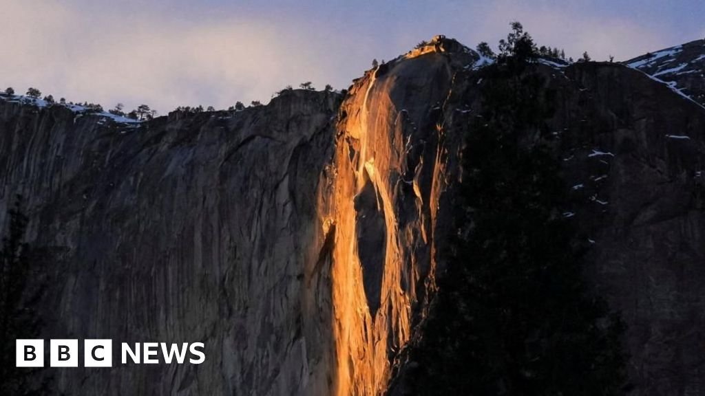 Yosemite waterfall turns molten orange