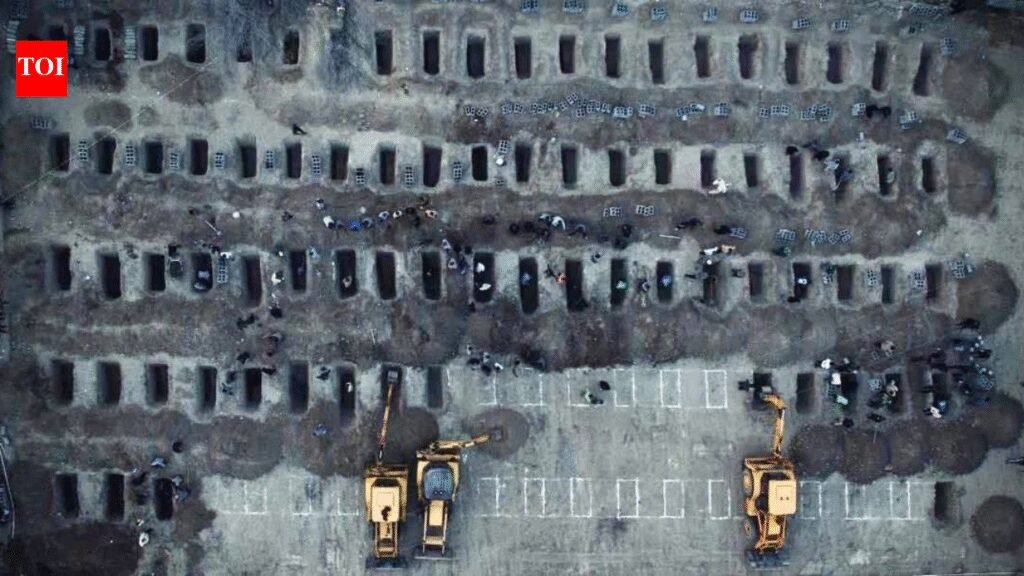 Us Israel School Strike: ‘From Gaza to Minab’: Iran shares image of hundreds of graves being dug after 160 dead in school strike