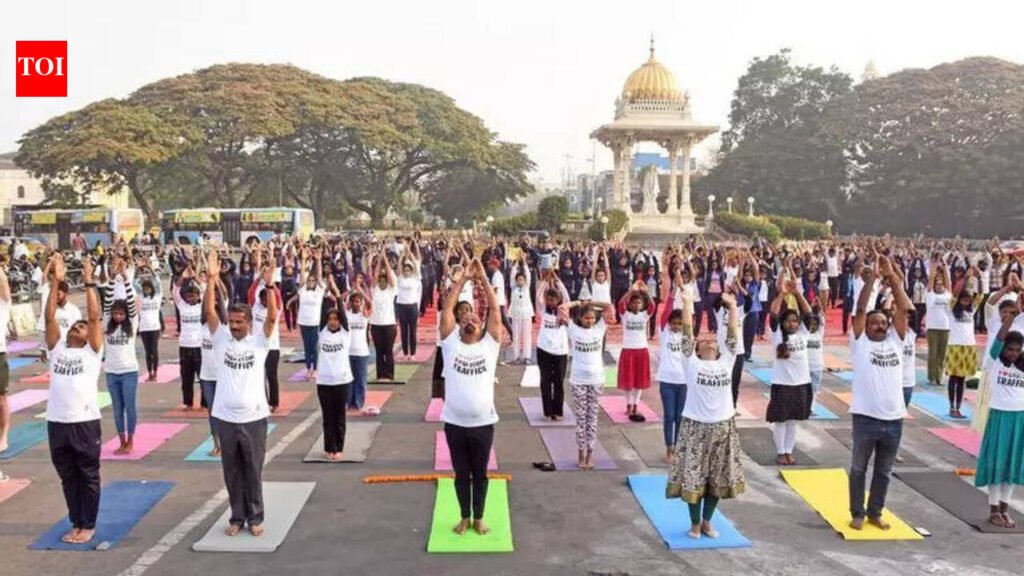 Hundreds join ‘Yoga Stop Trafficking’ protest in Mysuru | Mysuru News