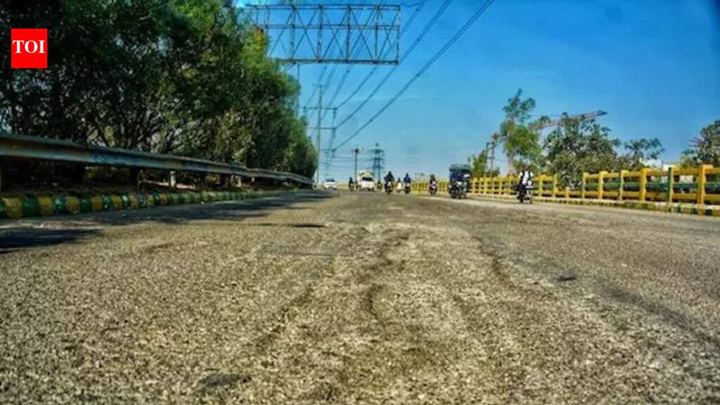 Key road linking NH-9 & RRTS station riddled with potholes | Noida News