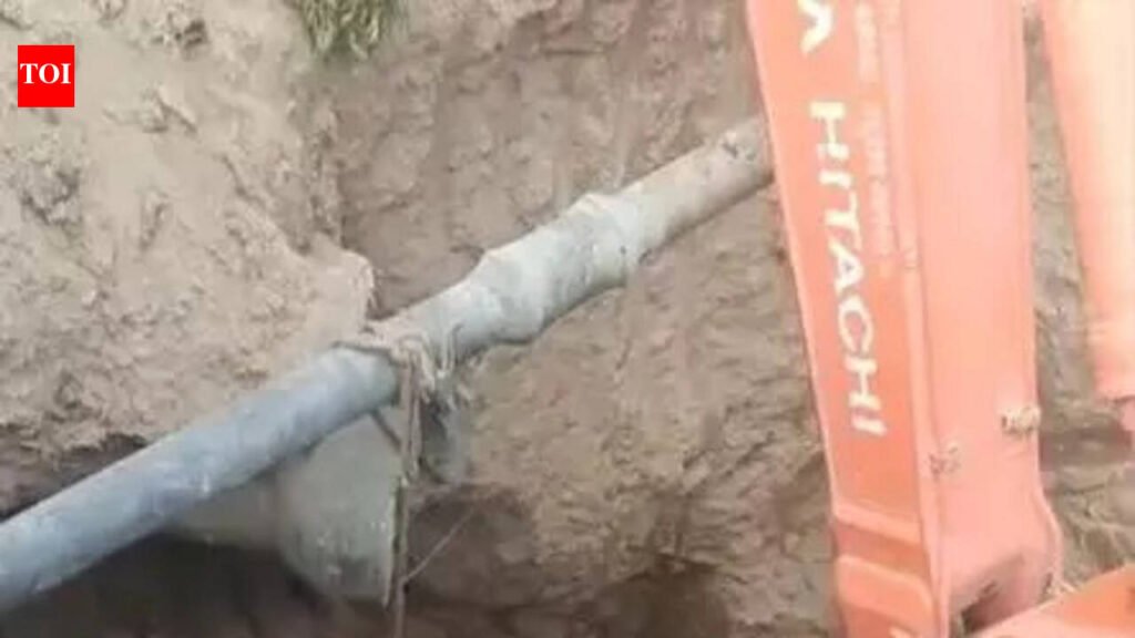 Mother, son fall into 20-ft metro excavation pit | Surat News