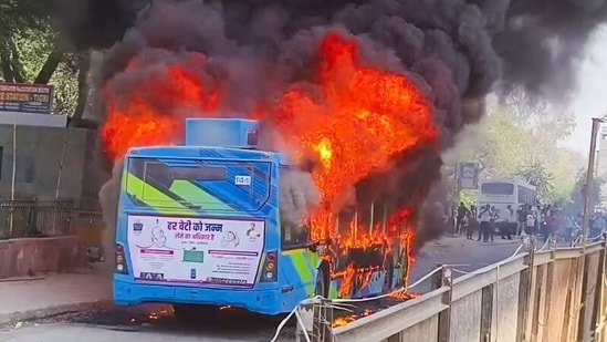 DTC bus runs over pedestrian, set on fire by angry residents in Delhi’s Nangloi