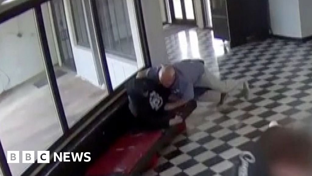 Moment gunman tackled by school principal