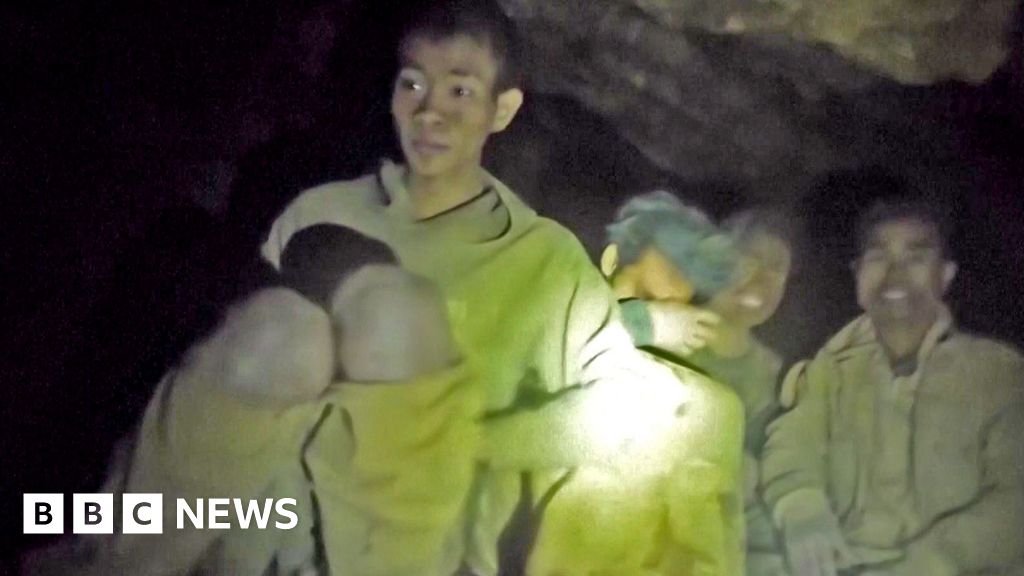 Moment rescuers find five men trapped in Laos cave