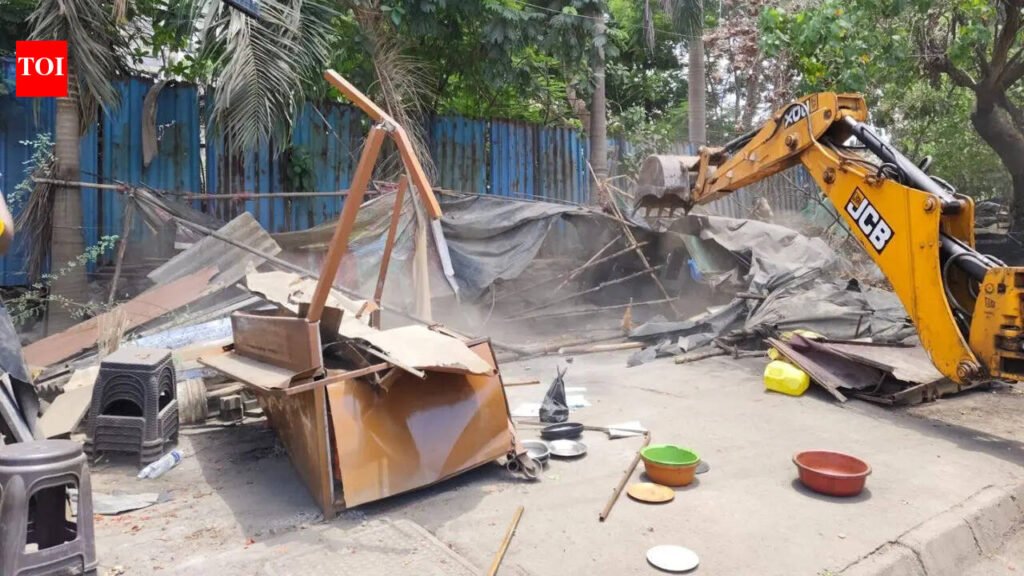 Illegal stalls demolished in Ulhasnagar anti-encroachment drive; residents demand action against roadside car market | Thane News