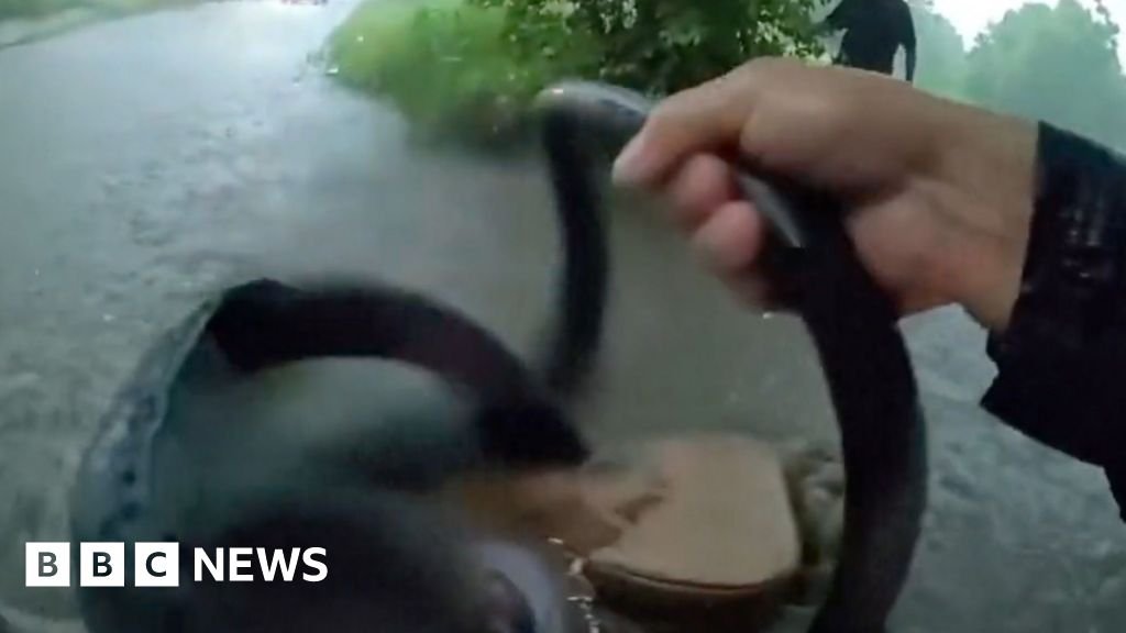 Texas police rescue baby from car stuck in floodwater