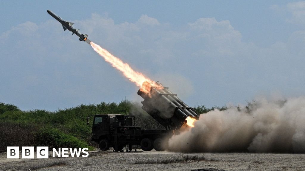 Japan’s defence minister denies militarism, criticises China’s ‘huge arsenal’