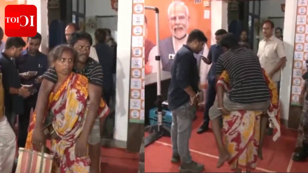 Watch: Woman carries husband on her back at CM Suvendu Adhikari’s Janta Darbar in Kolkata | Kolkata News