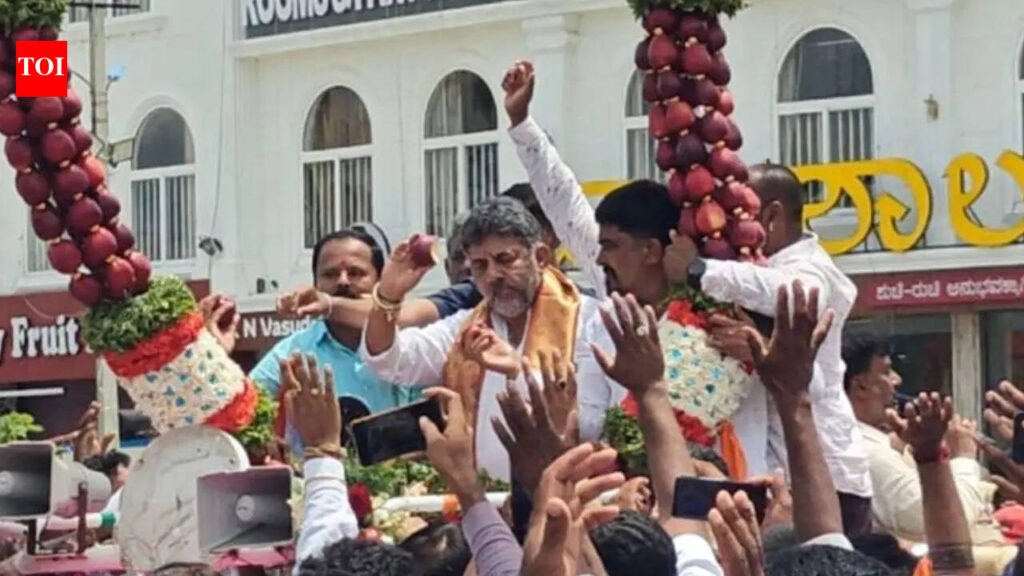 Viral video of DK Shivakumar tossing half-eaten apples at fans sparks BJP backlash | Bengaluru News