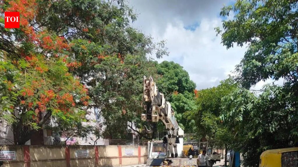 Pole on newly-resurfaced Prof UR Rao Road in Bengaluru relocated after public outrage | Bengaluru News