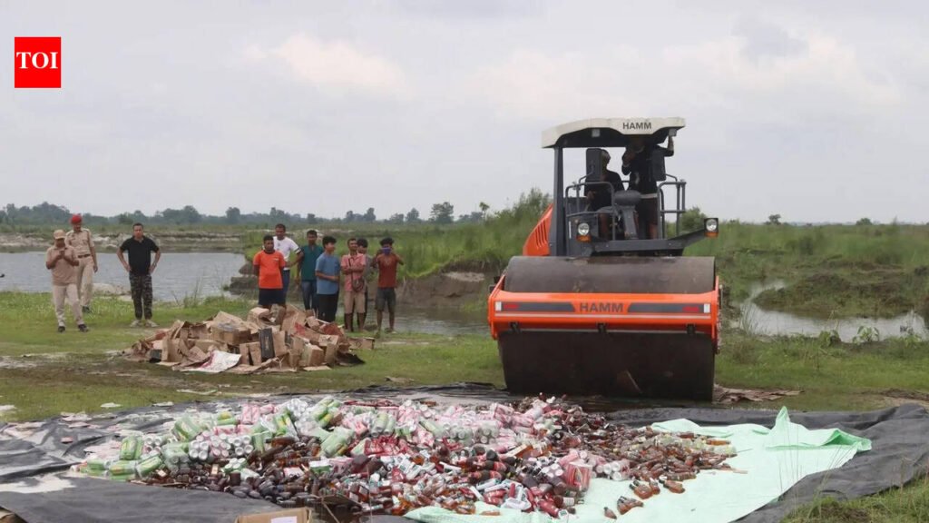 Majuli police use road rollers to crush bottles of illegal liquor, 1,475 litres destroyed | Guwahati News