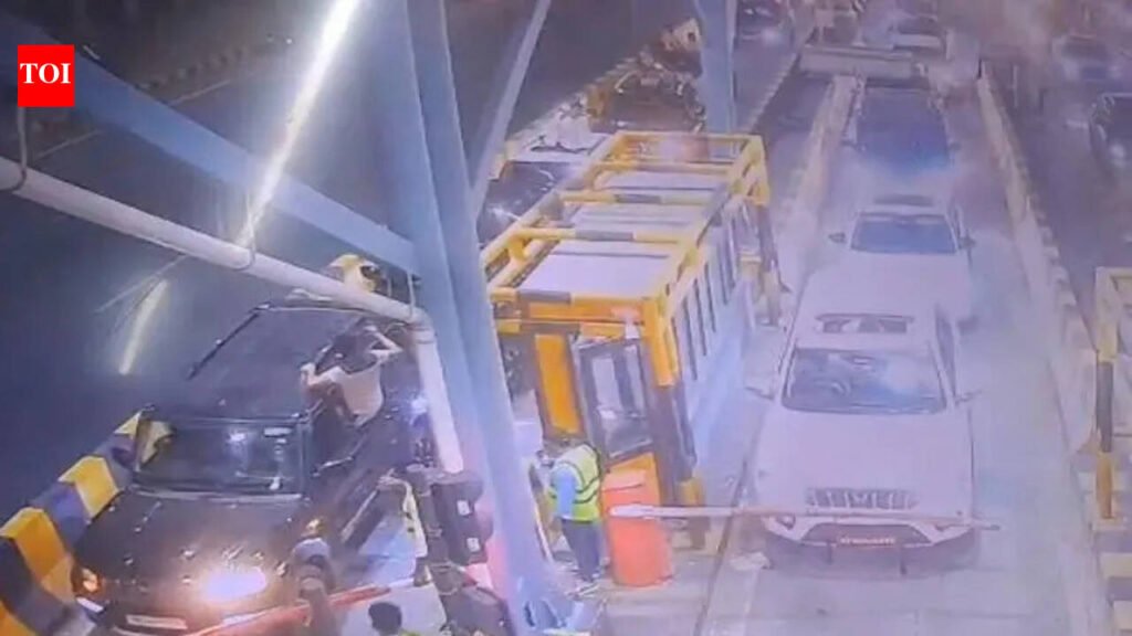 Blaring sirens, over a dozen cars break past barrier; toll staff thrashed | Noida News