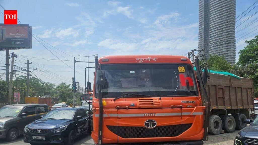 Truck helper crushed to death after jumping from trailer after collision in Gurgaon | Gurgaon News