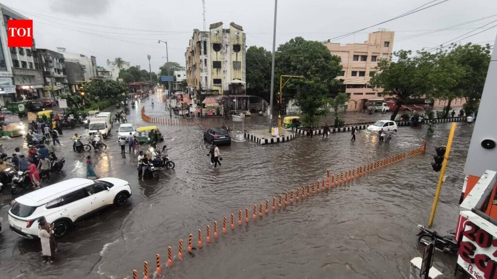 Drainage claims washed away by two-hour downpour | Surat News