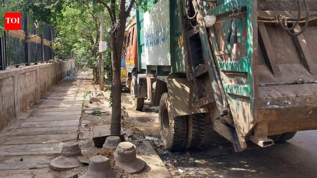 Footpaths still double up as garbage transfer points in Bengaluru | Bengaluru News