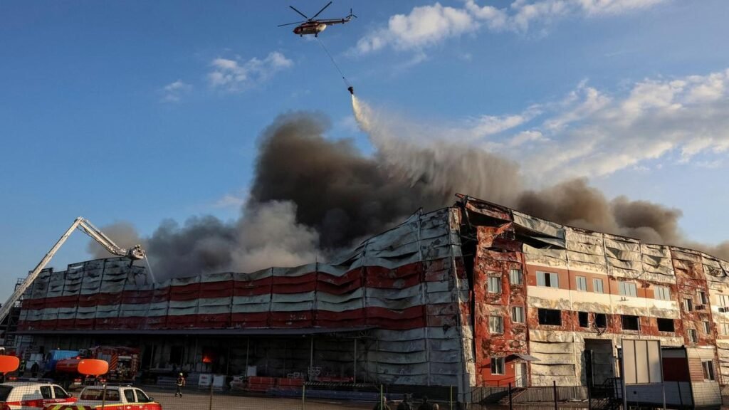 Russian missiles strike Kyiv killing one, wounding 13