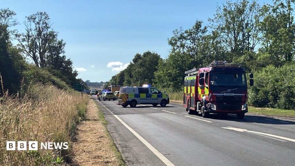 Man dies after crash involving bus and van on A40 near Llandeilo