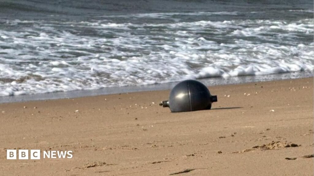 Australia probes mystery space balls that washed up on beach