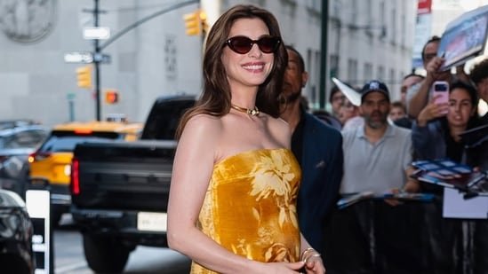 Anne Hathaway brings old Hollywood glamour to maternity style in strapless gown for The Odyssey press tour: Pics