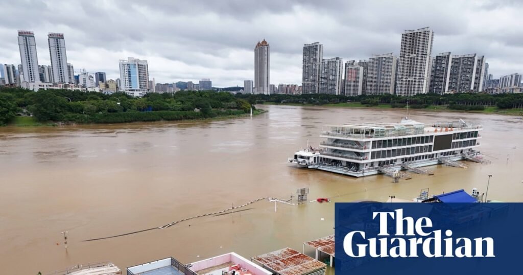 Weather tracker: Typhoon leaves people stranded on rooftops in China | China