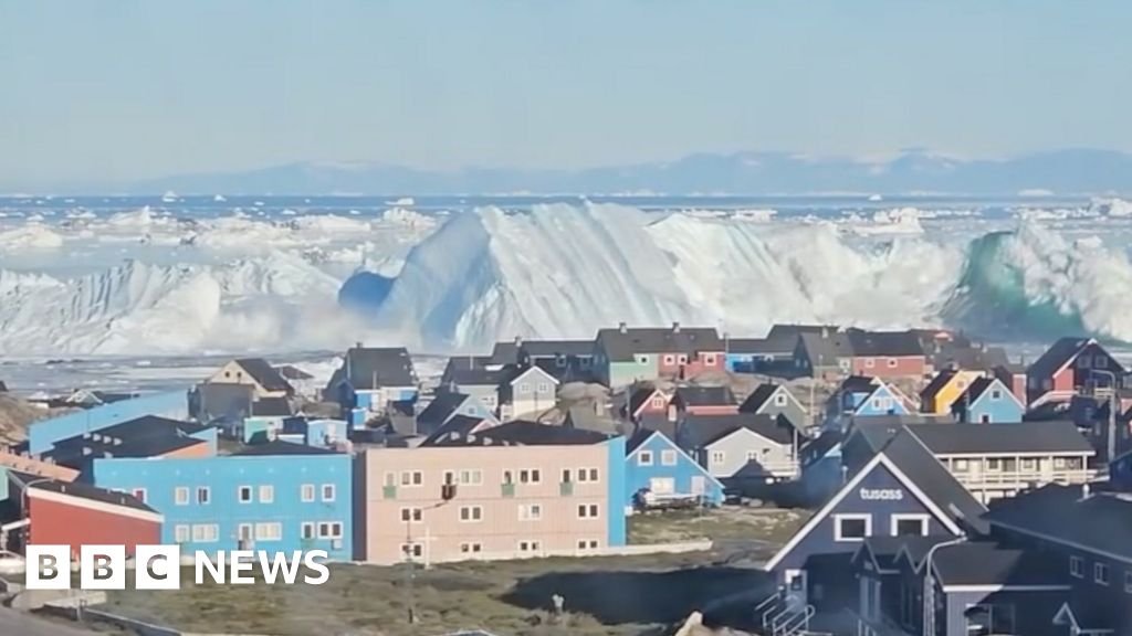 Giant iceberg turns over near Greenland’s coast