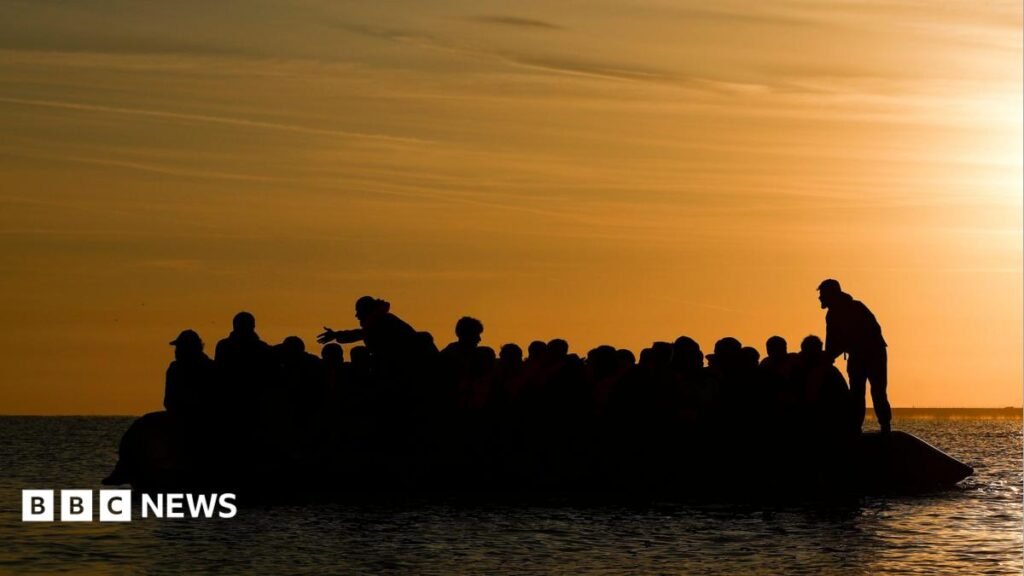 Record 128 people cross English Channel in one small boat