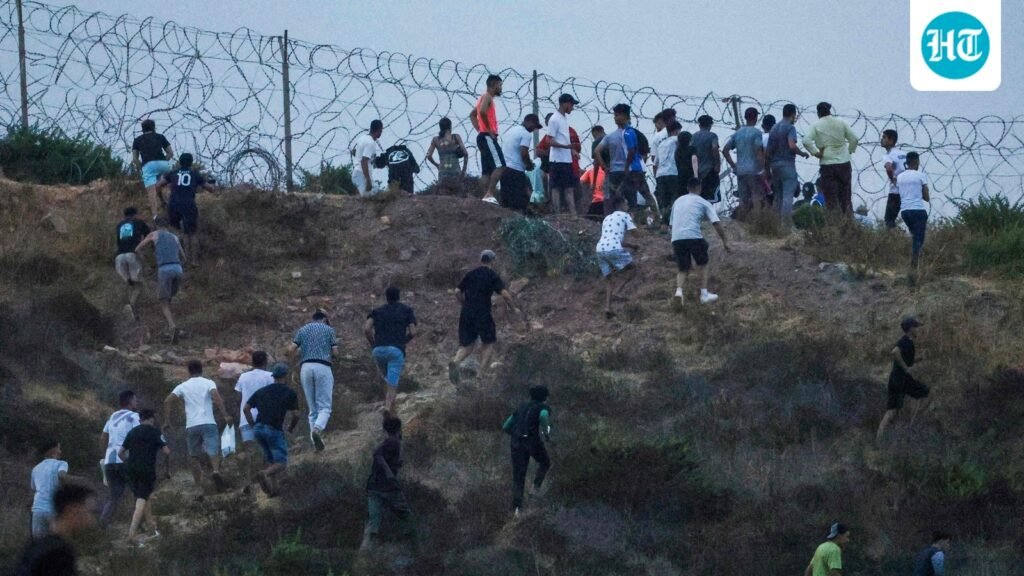 What to know about Ceuta, Spain’s immigration policy as latest videos show massive migrant influx from Morocco