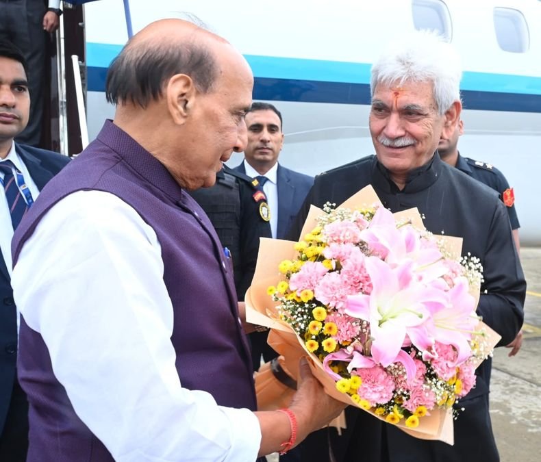 LG Sinha welcomes Defence Minister Rajnath Singh at Srinagar airport
