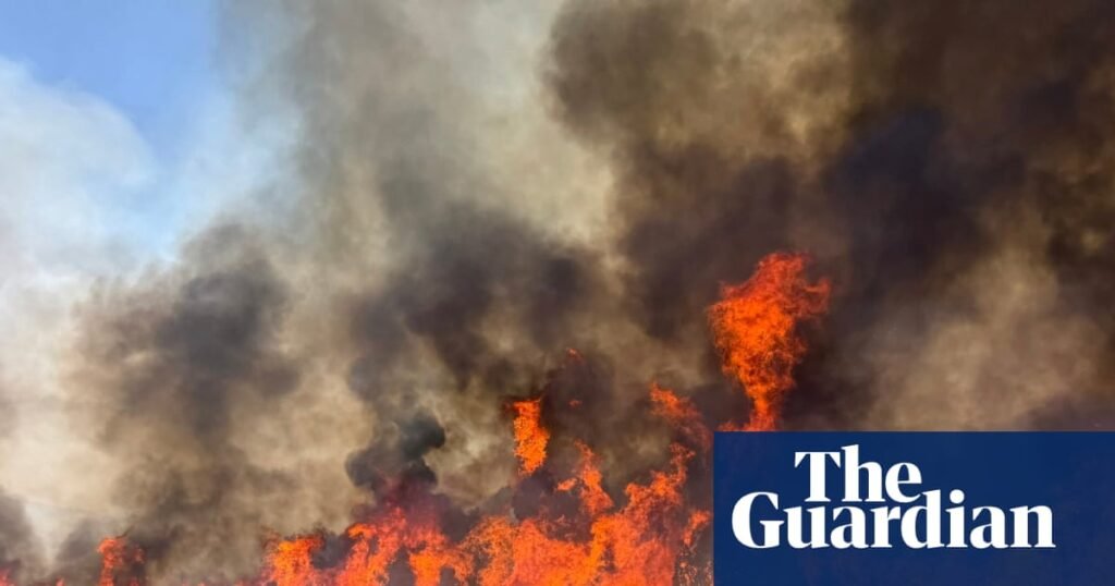 Helicopter fighting Utah wildfire crashes with two people onboard, officials say | US news
