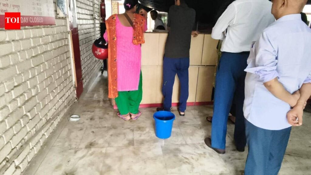 Leaking post office works under buckets in Greater Noida | Noida News