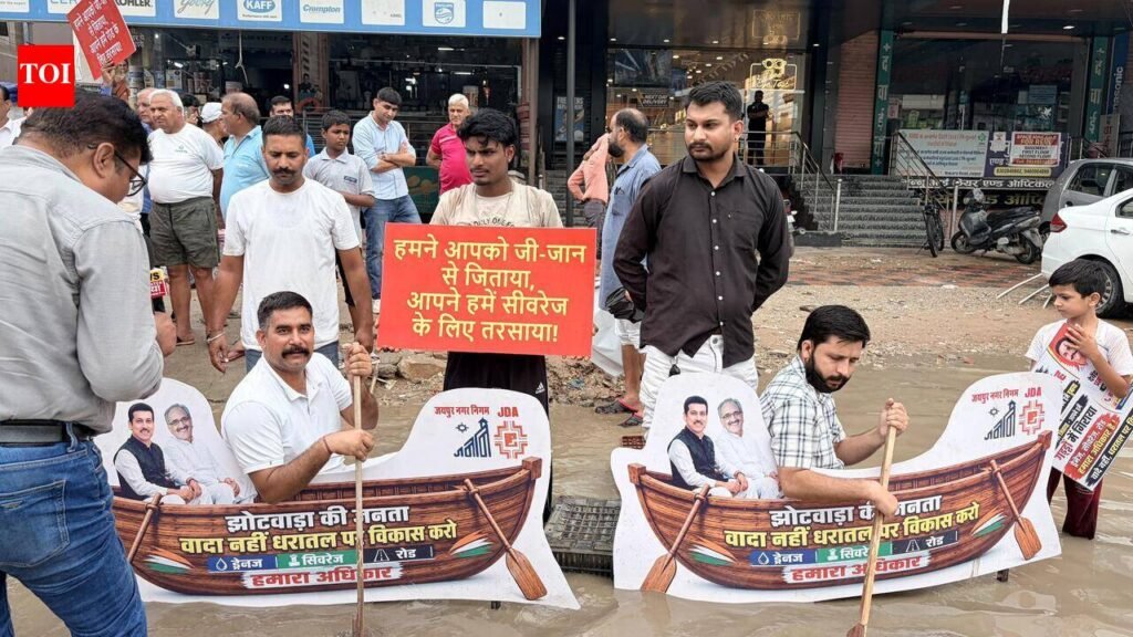 Boats on waterlogged roads, effigy burnt as Jhotwara residents protest | Jaipur News