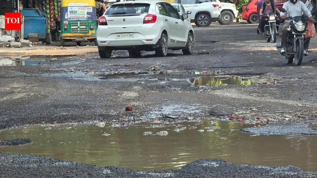 1 year on, key road in Gurgaon Sector 9A riddled with craters, commute a nightmare | Gurgaon News