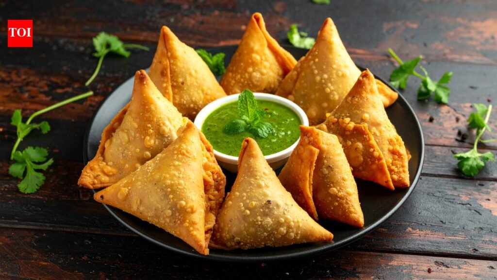 How did samosa become an Indian favourite despite not originating in India?