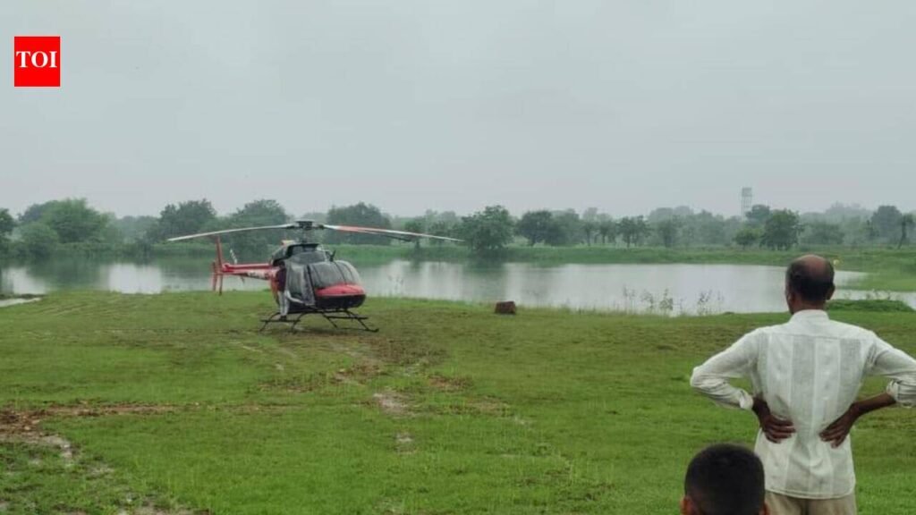 Chopper lands on bullock cart racing track, villagers rush to take selfies | Nagpur News
