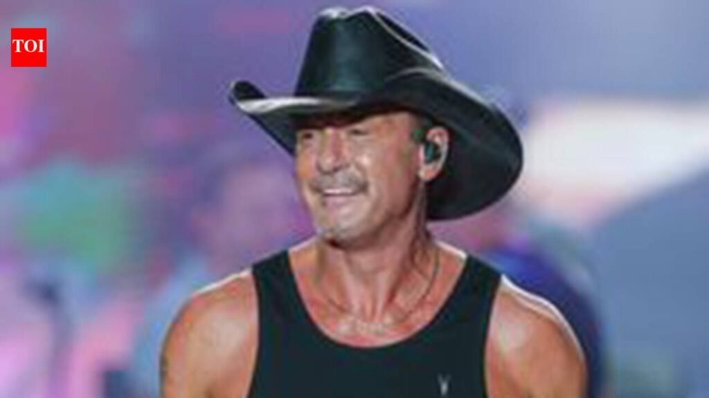 Tim McGraw falls from platform while performing in Cincinnati, laughs off incident and tells fans ‘there’s hole there’ |