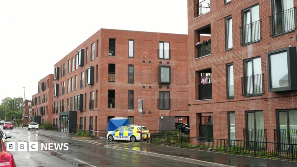 Two murder arrests after man who fell from Salford balcony dies