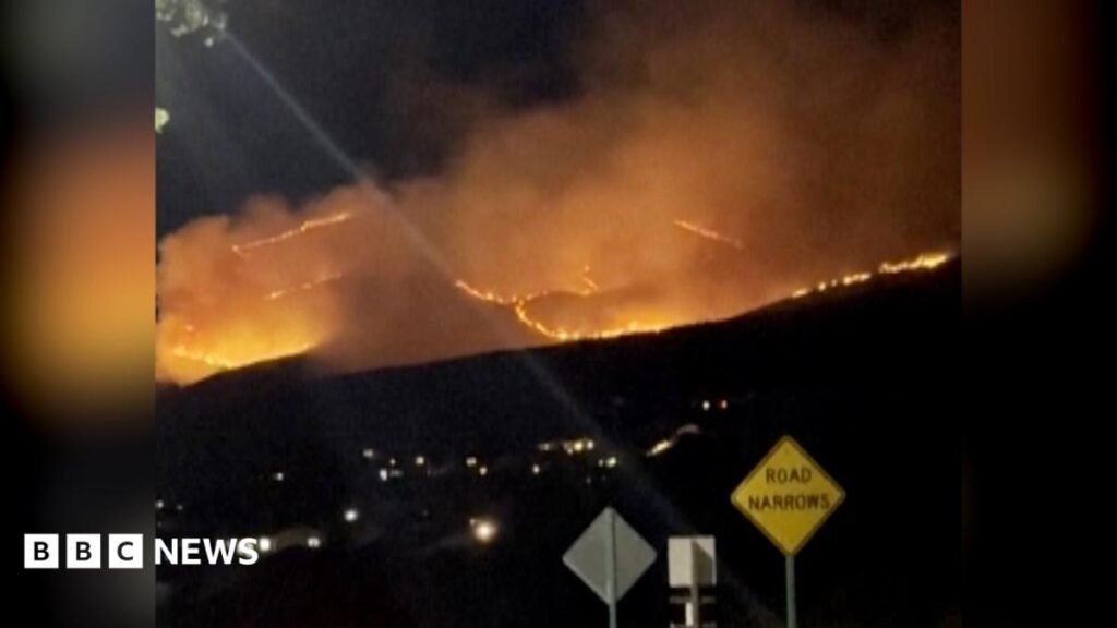 Nevada wildfire: Wildfire seen near Reno as tens of thousands told to evacuate