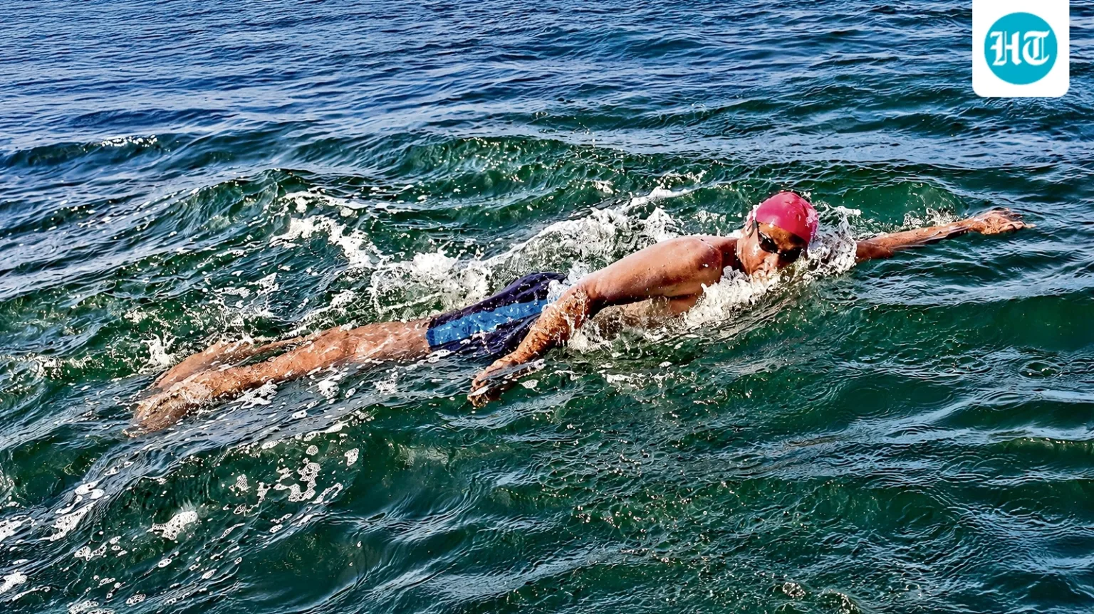 Bouy wonder: Meet the open-ocean swimmer setting world records at 21