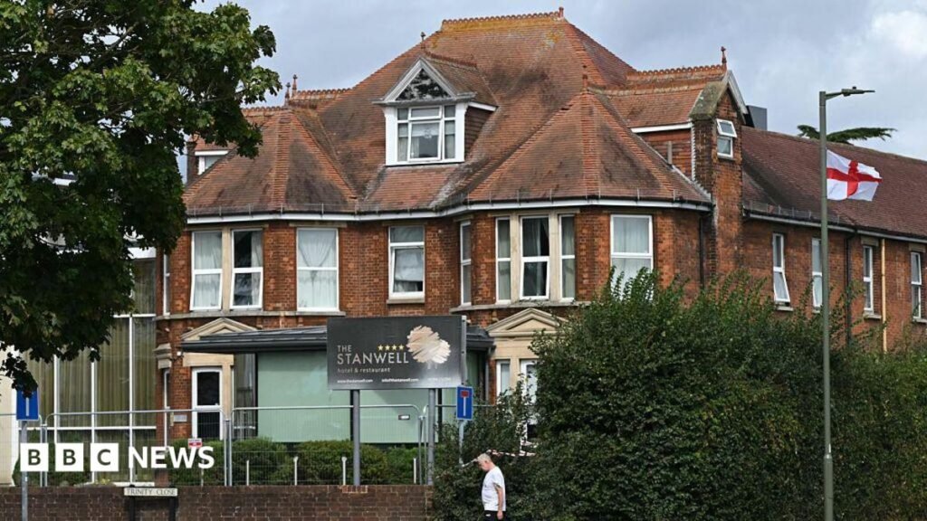 Man arrested over suspected stabbing at Surrey asylum hotel