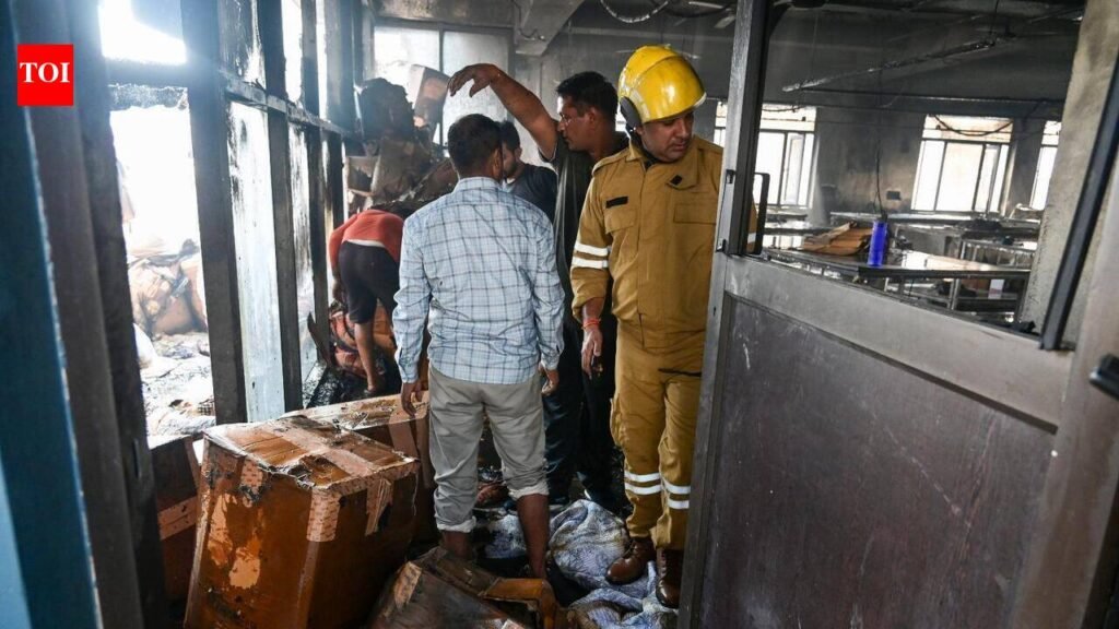 Factory on fire after AC short circuit | Noida News