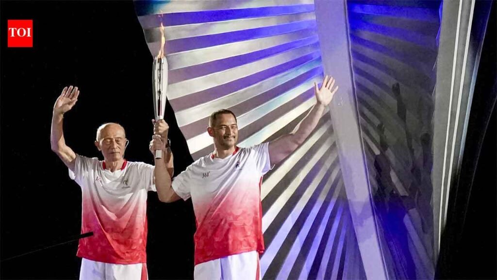 Father-son duo makes history: Five-time Asian Games champion Shigenobu Murofushi and Olympic gold medallist son Koji light cauldron in Aichi-Nagoya | Asian Games 2026 News