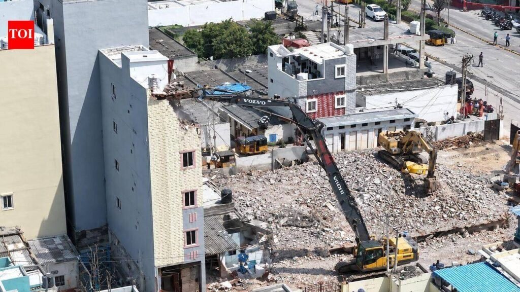 Tilted four-storey building in Gopanpally demolished | Hyderabad News