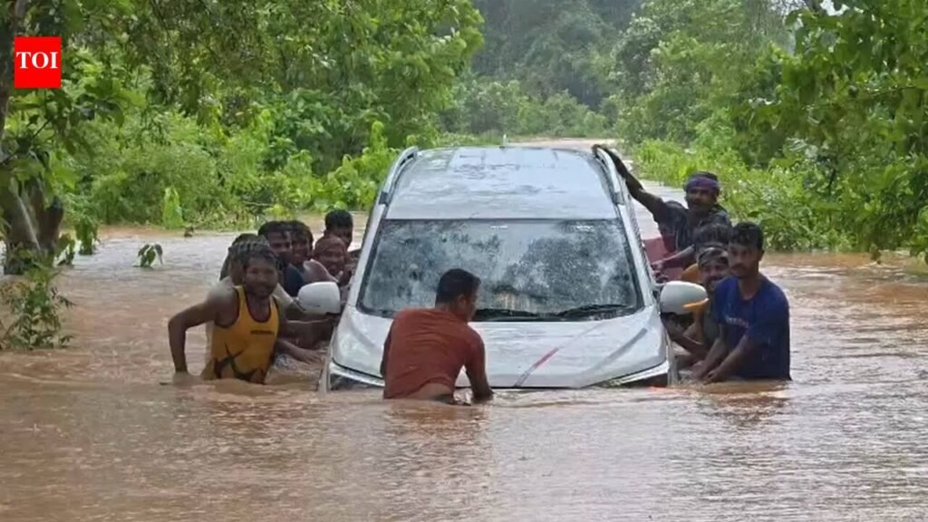 Teacher swims to safety as floodwaters sweep away car, driver rescued after 2 hours | Bhubaneswar News