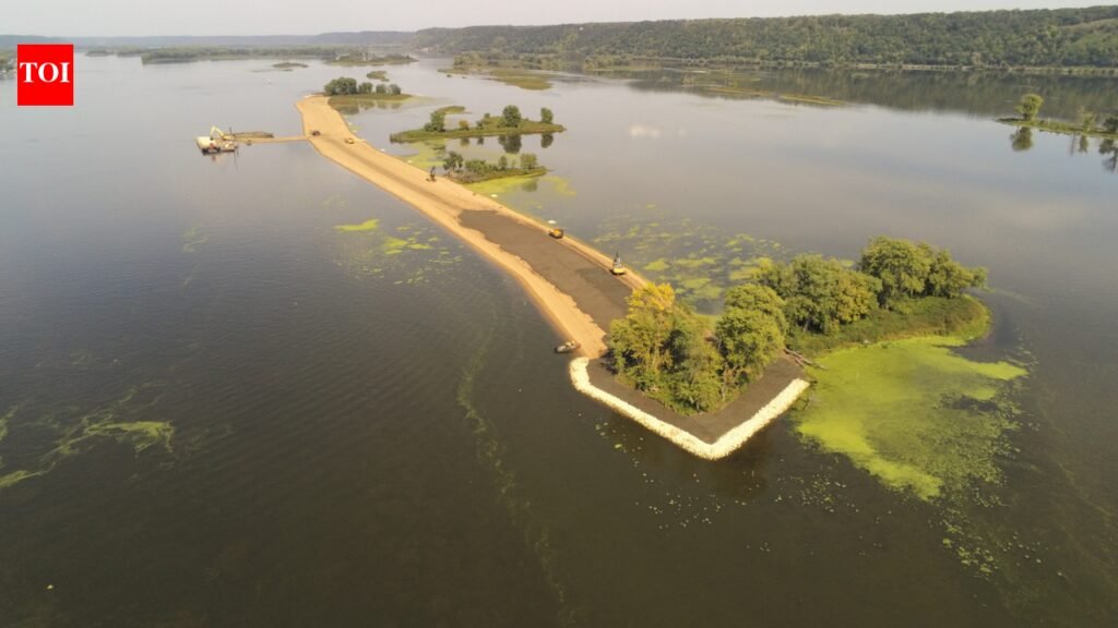 Mississippi River islands near Iowa have been disappearing; a $40 million project is now rebuilding the habitat with dredged material and is designed to protect or restore about 630 acres of river and backwater habitat