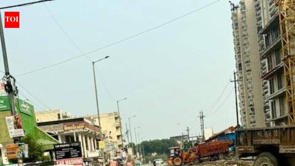Road used by office-goers, school kids riddled with potholes | Noida News