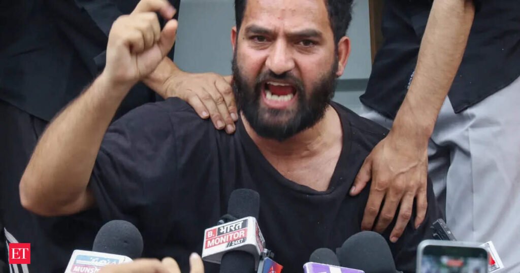 AAP MLA Mehraj Malik marshalled out of J-K Assembly