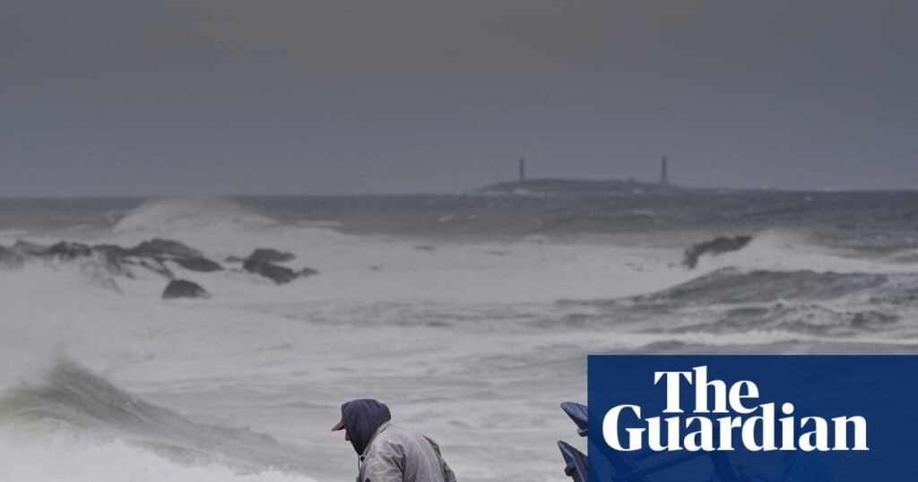 Power outages and flooded roads as major storm bears down on US north-east | Extreme weather