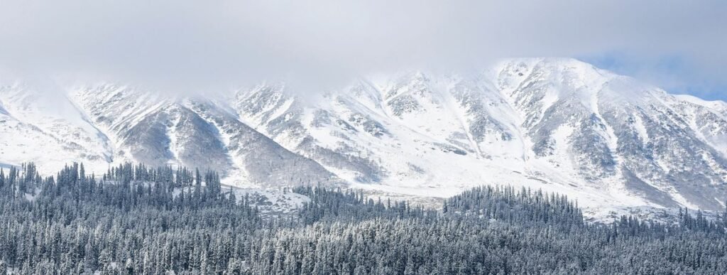 Fresh Snowfall in Gulmarg’s Affarwat, Rain Brings Down Temperatures Across Kashmir